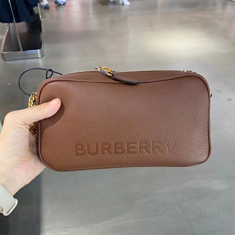 BURBERRY EMBOSSED LOGO LEATHER CROSSBODY BAG